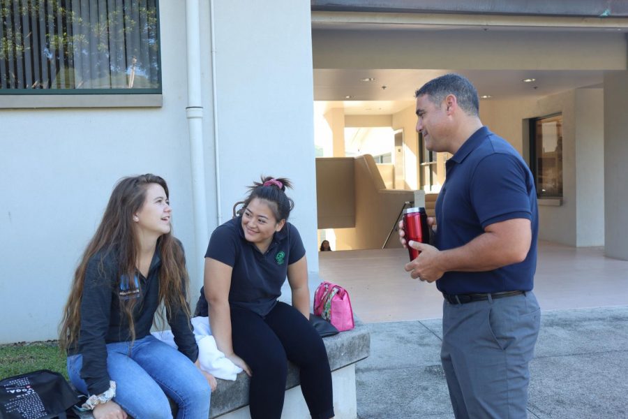 High School Principal Paul Passamonte meets with high school students. 