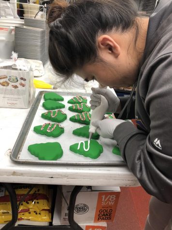 Mid-Pacific senior Skylar Tanaka works at her family's bakery part-time. Some students say after-school jobs can teach life lessons such as managing personal finances and balancing workloads. 