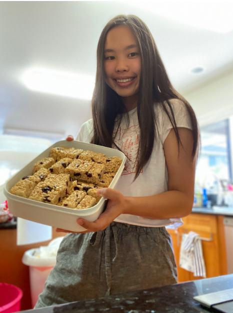 Kaci Muromoto showcasing the craisin energy bars she made. Muramoto has made cooking her routine since the stay-at-home order started. 