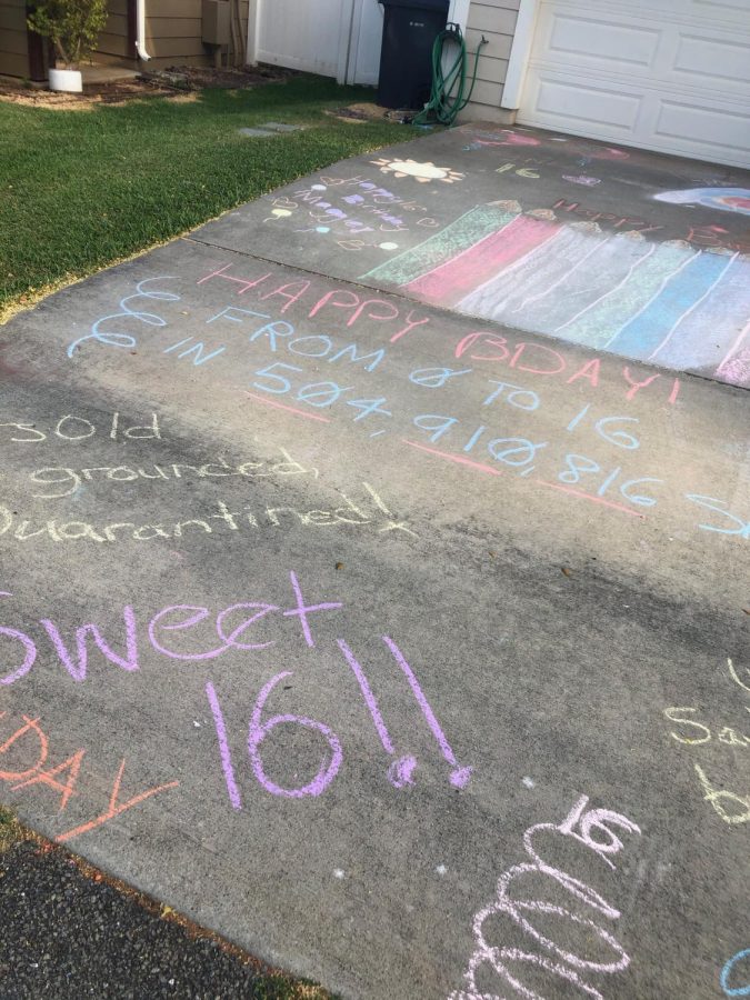 A driveway decorated for a drive-though sweet 16 birthday party. Students have found other ways to celebrate milestone events during the stay at home order.