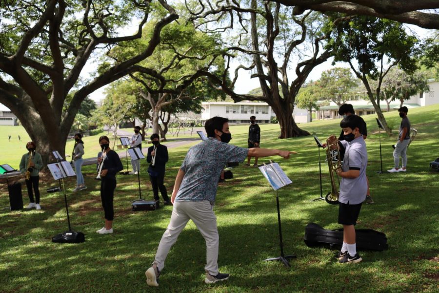 Band students practice using their instruments while outside and socially distanced. Before being allowed to play in person, students focused on other activities while in class.