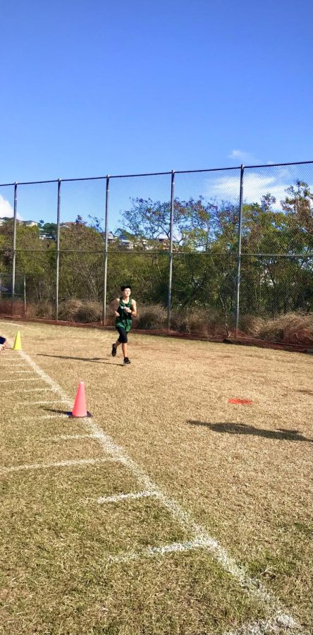 No mask requirement helps runners like sophomore athlete Trevor Okinaka run a good race at Junior Varsity Championships.