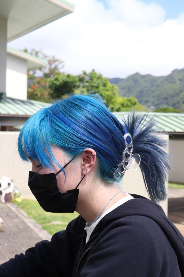 Madison Watanabe '23 sporting blue-colored hair.