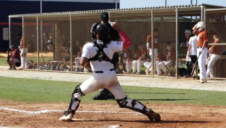 Senior 22’ Kodey Shojinaga as ump/catcher in his Hawaii Elite game. 