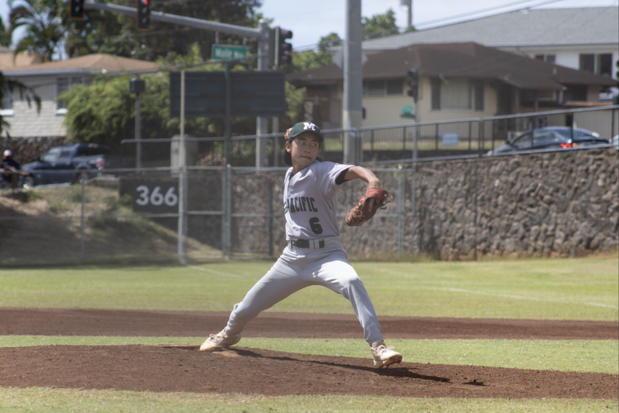 Freshman Kyler Shojinaga gets ready to release the ball during the JV championships against Kamehameha.