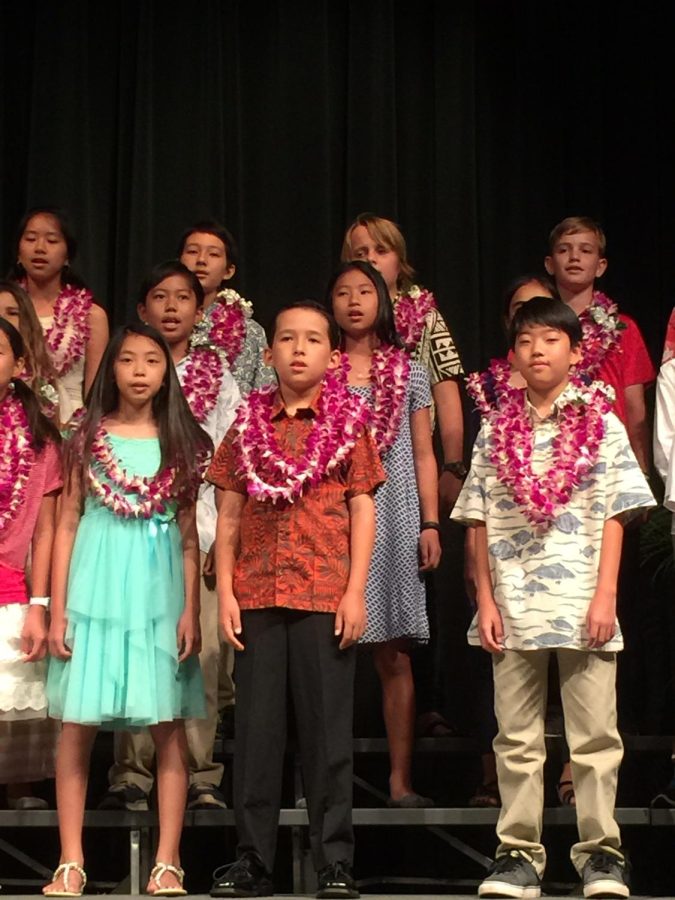 Mid-Pacific senior lifers sing at Leave Taking, the ending of elementary and entering of middle school ceremony. These seniors will be graduating on May 28.