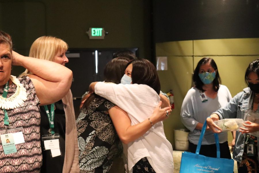 Mid-Pacific give farewell hug to WASC committees.