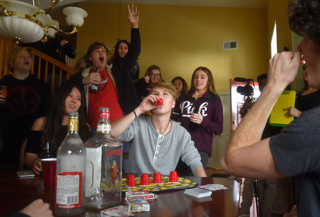 Young adults engage in underage drinking
