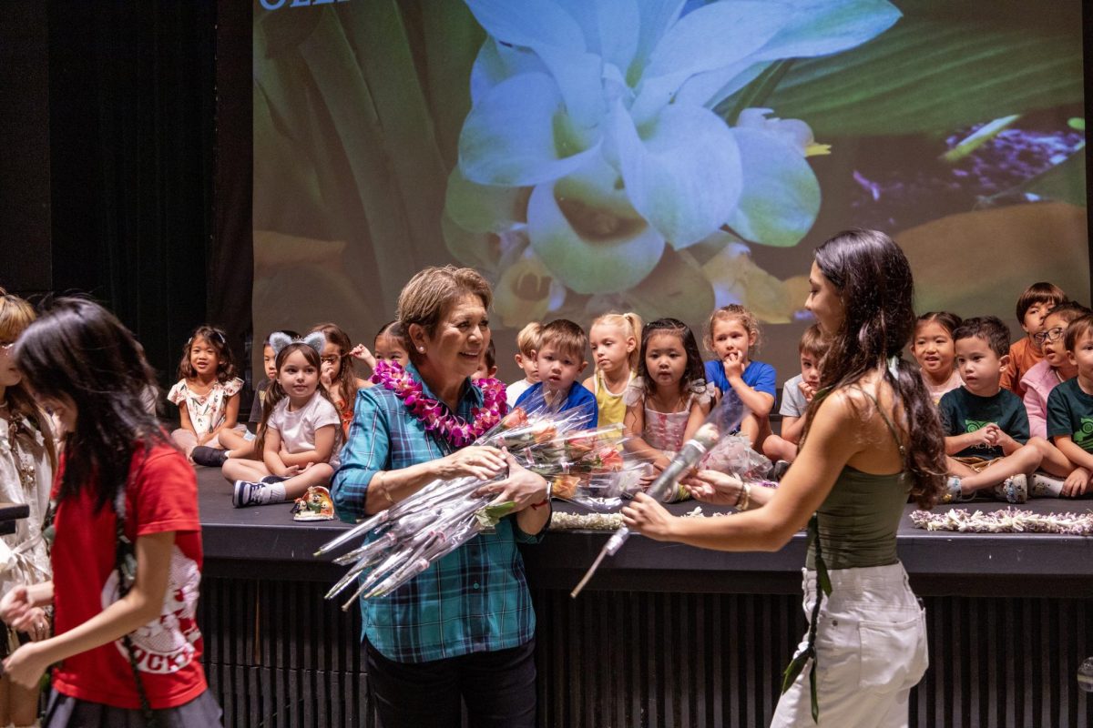 Dr. Edna Hussey receiving more flowers